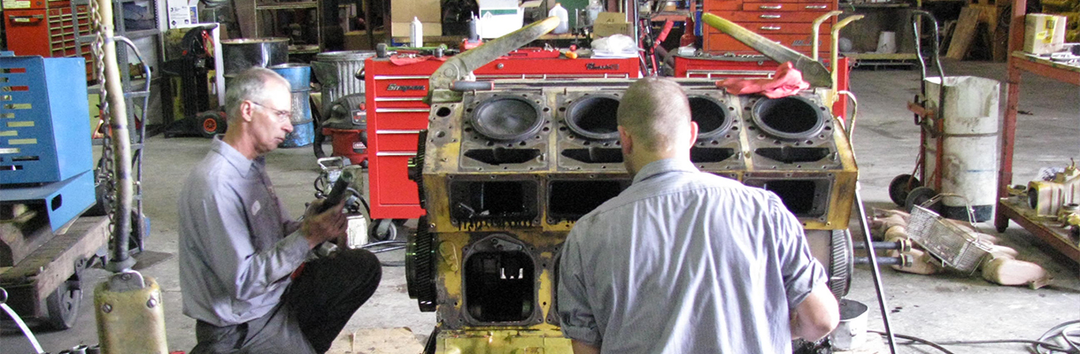 The Rutt's Team Working on Cylinder Heads